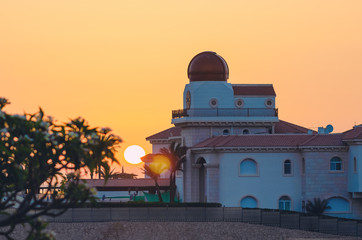 View of the hotel building at sunrise, dawn at a resort in Egypt