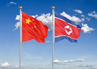 China vs North Korea. Thick colored silky flags of European Union and Uruguay. 3D illustration on sky background. – Illustration
