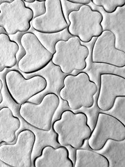 Heart and flower shaped dough for cookies - homemade dessert  - cooking  at home