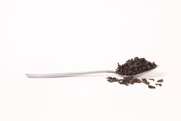 dried leaves black teas spoon