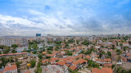 Fototapeta na wymiar View of the old Antalya from the height of the drone or bird's-eye view. This is the area of the old town and the old harbor.