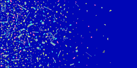 Colorful colored confetti on a blue background.