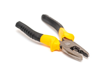 Pliers yellow and black color on white background. Pliers on white background