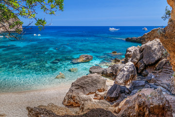 Fototapeta na wymiar Sardinia, holidays, Cala Biriola Beach, sea with crystal clear azure water. Italy, best beaches in Sardinia.