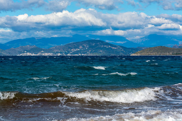 Fototapeta na wymiar Dramatic view on dark stormy sea on Peloponnese, Greece