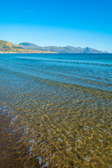 Coastline with sandy beach and clear sea water in Alcamo Marina, small town in Sicily, Italy, summer vacation destination