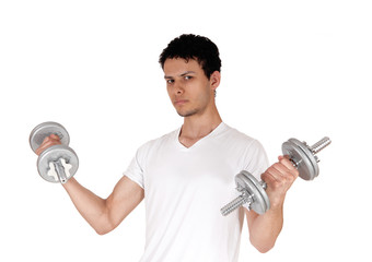 Close up of a young man exercising with two dumbbells