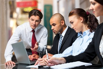 Successful business team  isolated on white background