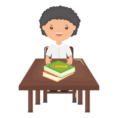 cute little student boy with books in schooldesk