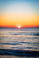 Fototapeta na wymiar Sunrise Over the Ocean