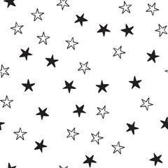 Star doodles seamless pattern. Hand drawn stars texture background.