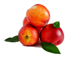 peaches with leaves isolated on white
