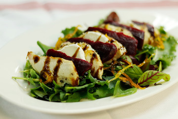 compound salad with chicken goats cheese and beetroot