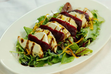 compound salad with chicken goats cheese and beetroot