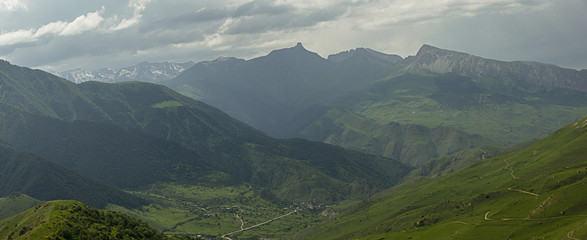 amazing view of mountain peaks, meadows and valleys. Panorama. High resolution. Toned.