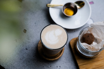 Obraz na płótnie Canvas Masala chai latte on gray concrete table
