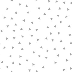 Triangles seamless pattern. Randomly distributed triangle texture background.