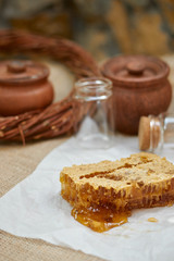 composition on a wicker table with honey comb