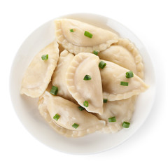 Plate of tasty cooked dumplings isolated on white, top view