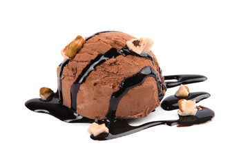 Scoop of chocolate ice cream with syrup and nuts isolated on white