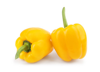 Ripe yellow bell peppers isolated on white