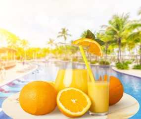 Orange juice and slices of orange on background © BillionPhotos.com
