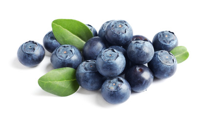 Fresh raw tasty blueberries with leaves isolated on white