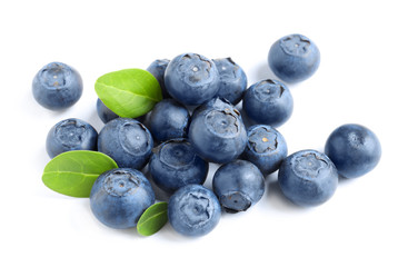 Fresh raw tasty blueberries with leaves isolated on white