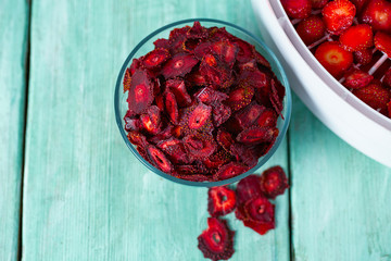 sliced strawberry on a fruit dryer rack