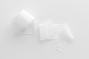 Proctology concept with toilet paper on white background top view