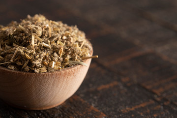 Pile of Dried Horehound on a Rustic Wooden Tabel