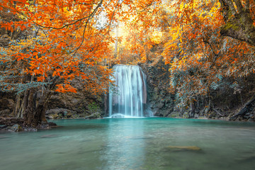 Scenic of nature with Beautiful Waterfall  in autumn forest at Erawan  National Park, Thailand ,Travel amazing asia
