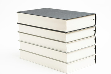 A Set Of Neatly Stacked Monochromatic Cloth Bound Books