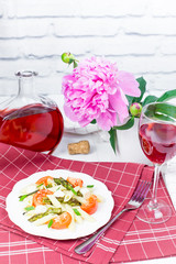 Penne pasta with tomatoes and asparagus.