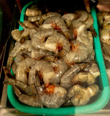 Group of shrimps displayed at a market stall