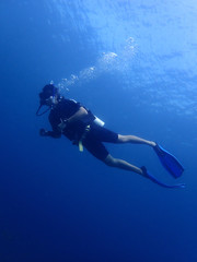 A scuba diver enjoy a leisure dive in Tunku Abdul Rahman Park, Kota Kinabalu. Sabah, Malaysia....