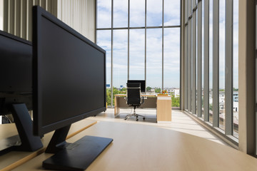 A wide-angle image of a modern office..