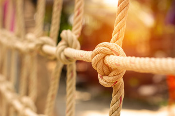 Closeup rope net for children toy in playground.