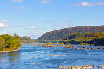 Harpers Ferry National Historic Park, West Virginia, USA. A view onto beautiful autumn panorama along riverbanks.