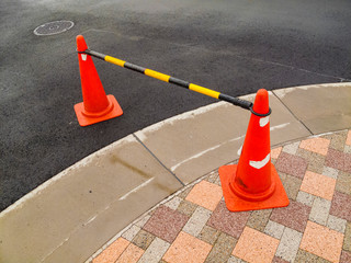 Witches hats on sidewalk