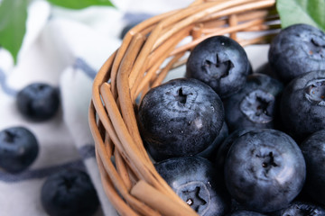 Freshly blueberries in wooden basket