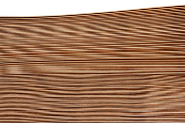 Stacked brown paper envelopes isolated on white background.