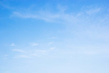 Fluffy blue sky background and white clouds soft focus, and copy space