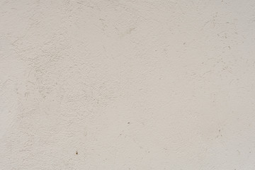 Texture of a concrete wall with cracks and scratches which can be used as a background