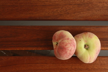 Paraguayan peach on wooden background