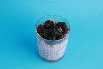 Fototapeta na wymiar glass of chia pudding with blackberry flavor