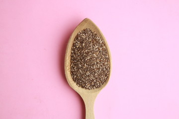 wooden spoon with black chia seeds