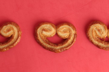 Puff pastry cookies on colorful background