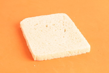 bread without rind in colorful background..