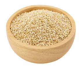 Quinoa in wooden ware isolated on white background